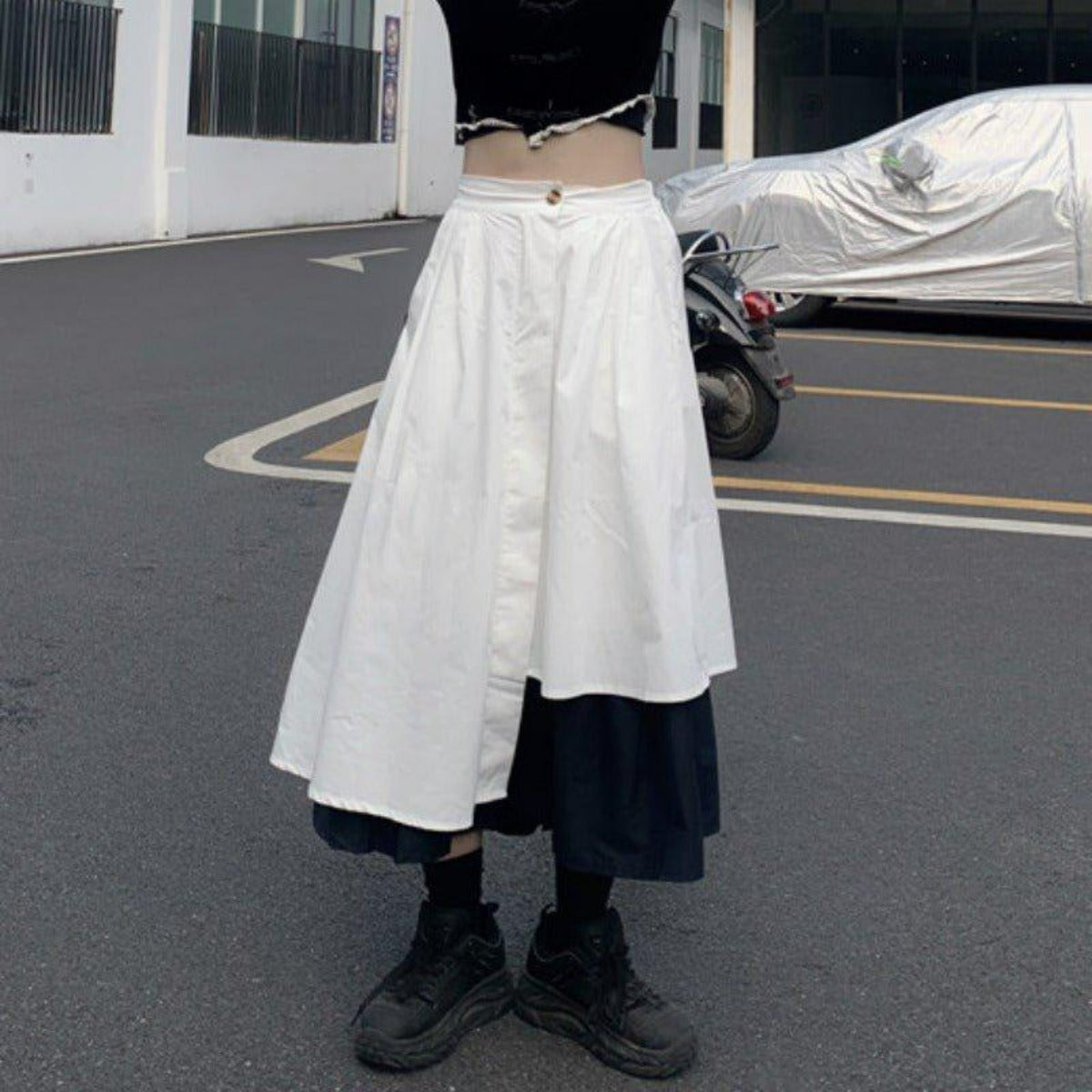 不規則なミッドレングスのAラインスカート - momo collection