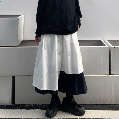 不規則なミッドレングスのAラインスカート - momo collection